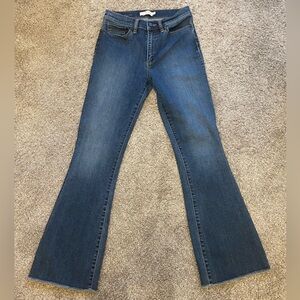 Tory Burch - Cat’s Meow frayed flare jeans. Size 26